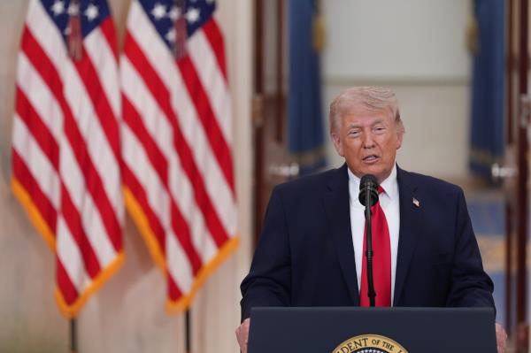 President Donald Trump speaks about the Iran war from the Cross Hall of the White House on Wednesday in Washington. (AP-Yonhap)